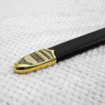 Close-up of the geometric-patterned tip on the black scabbard for Sviatoslav's sword