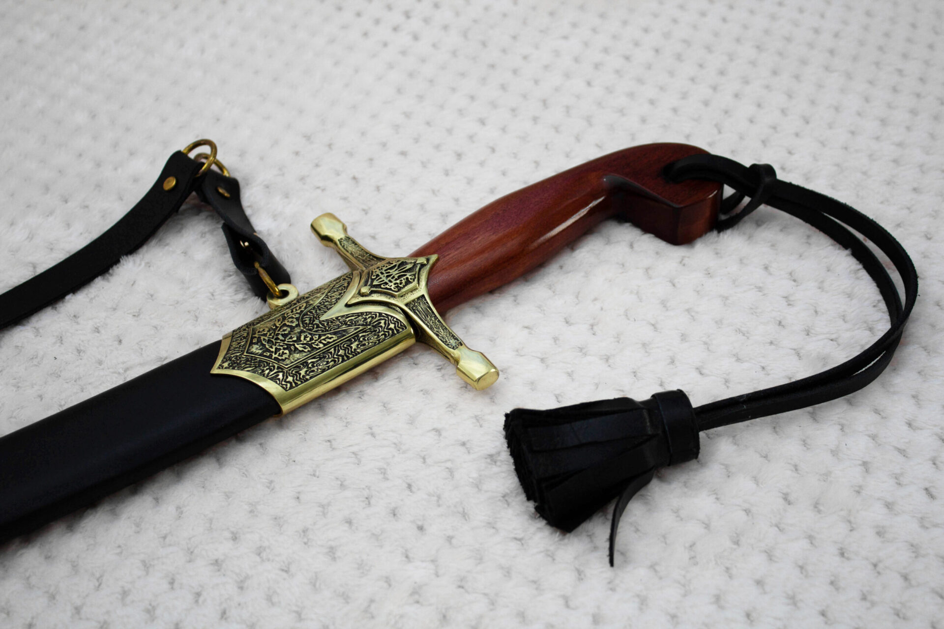 SiCh-Souvenir saber: reddish-brown grip, decorated guard and black scabbard